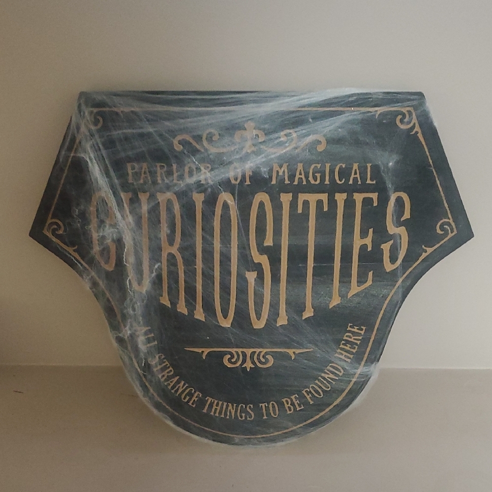 Decorative Sign with Gold Lettering